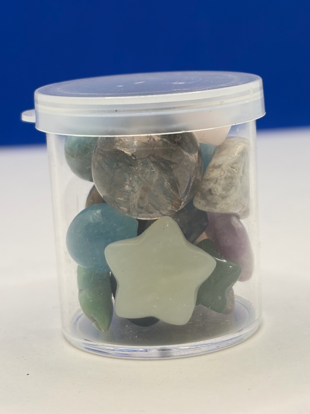 Assorted Polished Crystal Tumbles in 1” Clear Storage Jar - Picture 3 of 5